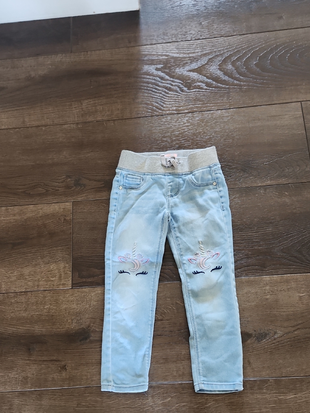 Girls' Light Blue Denim Jeans with Silver Waistband and Unicorn Knee Embroidery